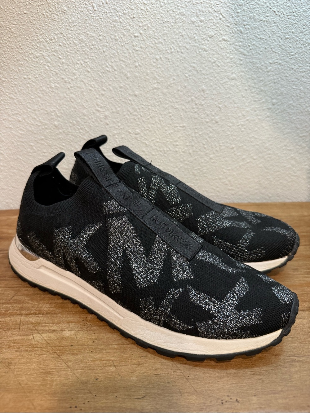 Michael Kors Felix Trainer Sneakers Women’s 9 Black Metallic Logo Knit Slip On